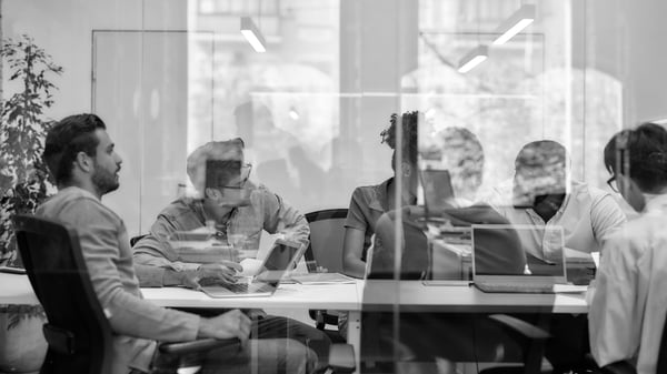 Meeting room full of people